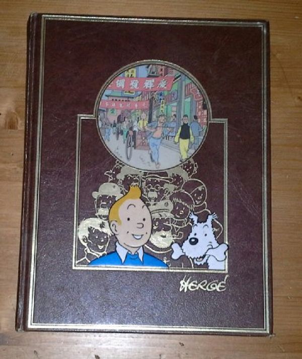 Cover Art for 9782203751507, Tintin : Le lotus bleu, L'oreille cassée, Le manitoba ne repond plus, L'éruption du Karamako by Herge