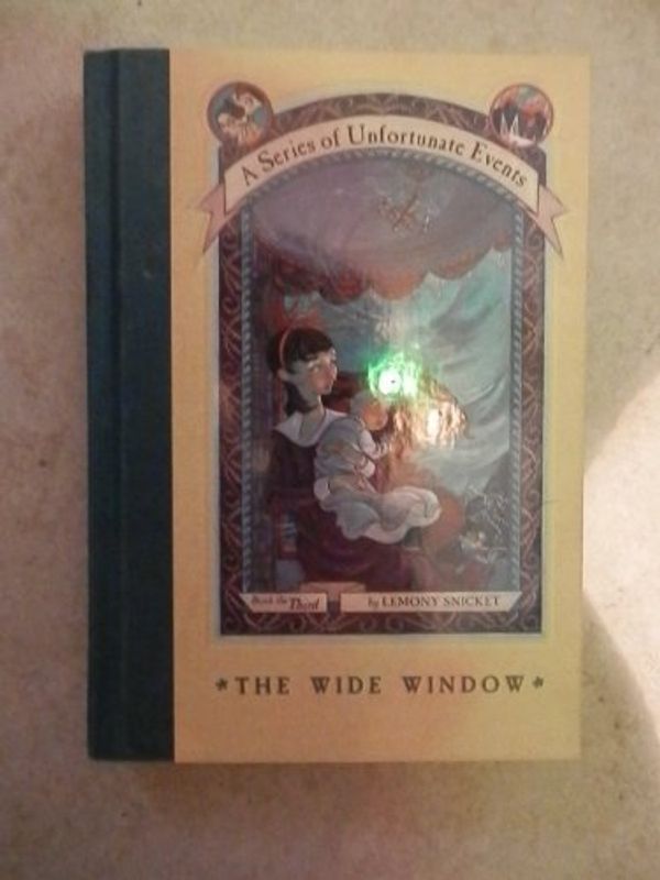 Cover Art for 9780439759069, A Series of Unfortunate Events: The Wide Window by Lemony. Illustrated by Brett Helquist. Snicket