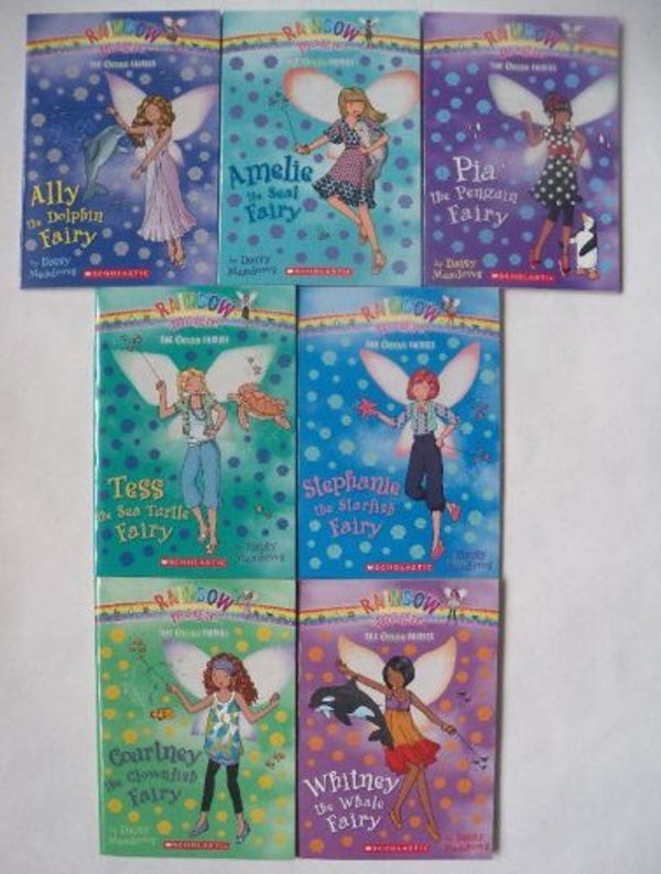 Cover Art for 9780545335799, Rainbow Magic: The Ocean Fairies Complete Set, Books 1-7 (Ally the Dolphin Fairy, Amelie the Seal Fairy, Pia the Penguin Fairy, Tess the Sea Turtle Fairy, Stephanie the Starfish Fairy, Whitney the Whale Fairy, Courtney the Clownfish Fairy) by Daisy Meadows