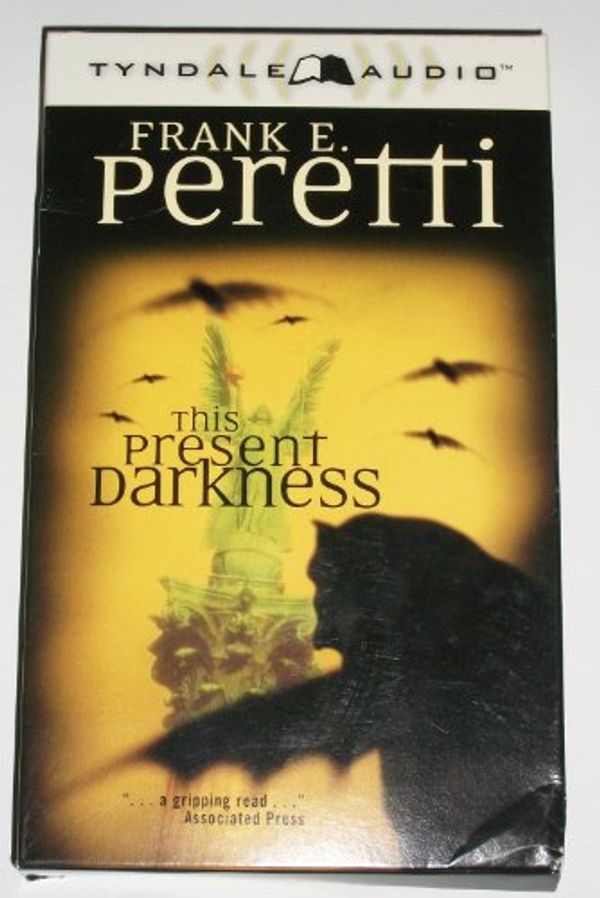 Cover Art for 9780842361729, This Present Darkness by Frank E. Peretti