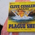 Cover Art for B001AYXM3M, Novel of the Oregan Files: Plague Ship on 13 unabridged CDs in hard, vinyl box by Clive Cussler