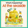 Cover Art for 9780746015407, At the Seaside (What's Happening?) by Heather Amery