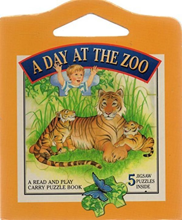 Cover Art for 9781588050663, A Day At The  Zoo Read and Play Carry Puzzle Book by N/A