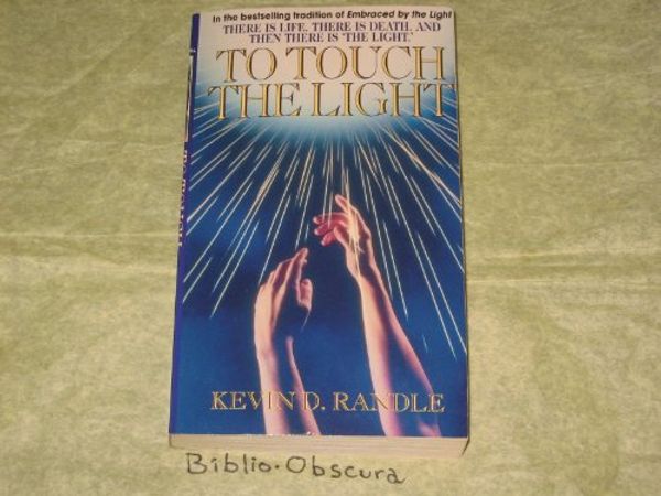 Cover Art for 9780786000470, To Touch the Light by Kevin D. Randle