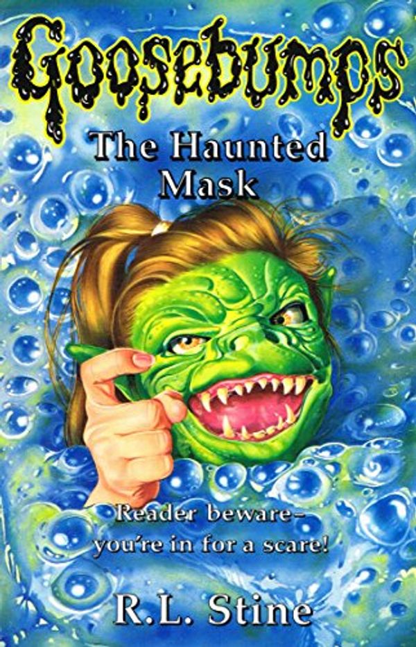 Cover Art for 9780590556682, The Haunted Mask by R. L. Stine