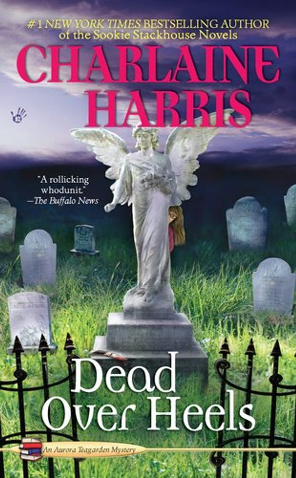 Cover Art for 9780684804293, Dead Over Heels (Aurora Teagarden Mysteries, Book 5) by Charlaine Harris