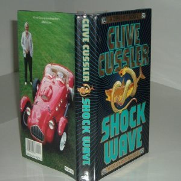 Cover Art for B0078EOAUC, SHOCK WAVE By CLIVE CUSSLER 1996 First Edition by Clive Cussler